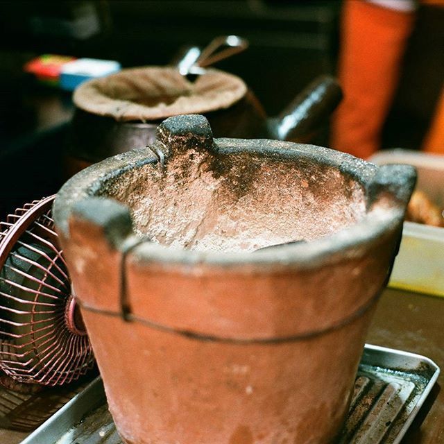 focus on foreground, close-up, indoors, metal, still life, food and drink, selective focus, no people, container, day, wood - material, table, food, metallic, animal themes, rusty, incidental people, high angle view, sunlight