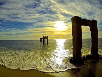 Scenic view of sea at sunset