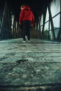 Rear view of man walking outdoors