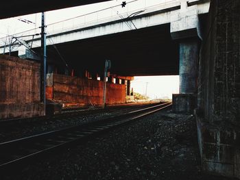 Train on railroad track against sky