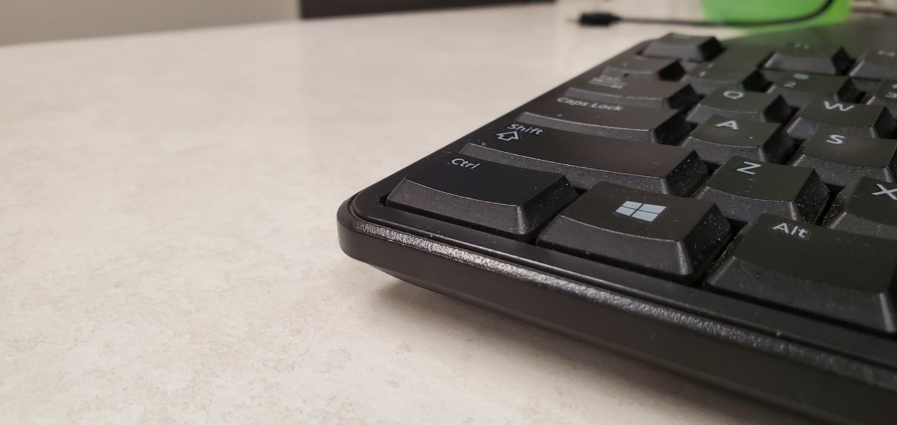 CLOSE-UP OF LAPTOP ON TABLE