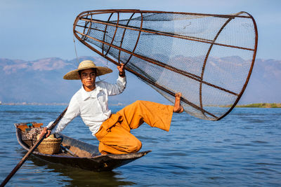 Burmese fisherman at inle lake, myanmar