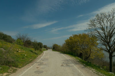 Street against sky on sunny day