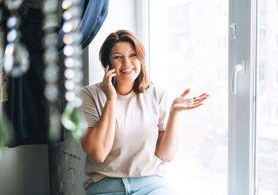 Young woman using mobile phone