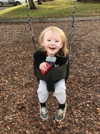 Portrait of smiling boy in playground