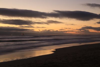 View of calm sea at sunset