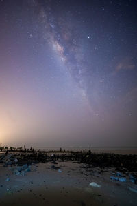 Scenic view of sea against sky at night