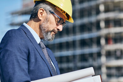 Engineer standing at construction site