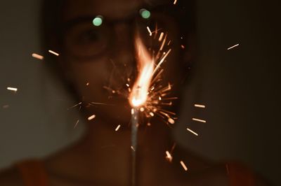 Close-up of firework display at night