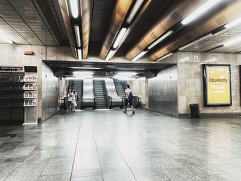 People walking in subway building