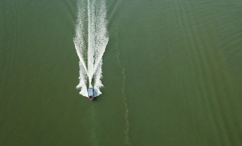 High angle view of boat sailing on sea