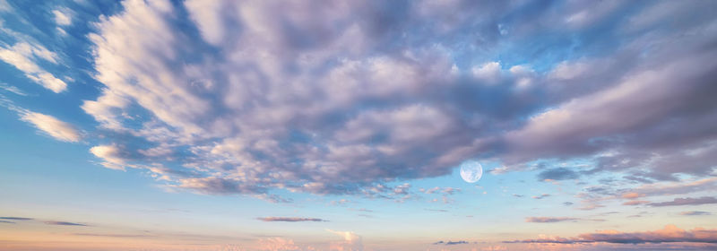 Low angle view of bubbles against sky at sunset