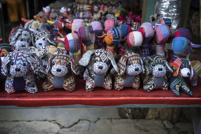 Close-up of statues for sale in market