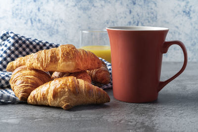 Close-up of coffee cup on table