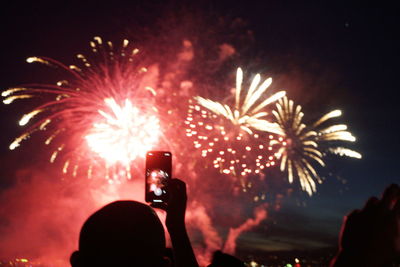 Firework display at night