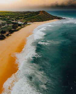 Scenic view of beach against sky