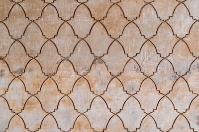 Full frame shot of wall with arabesque style patterns