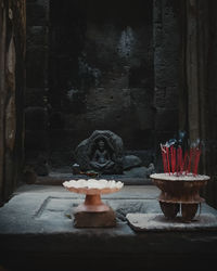 Sculpture of buddha statue outside building