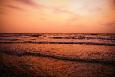 Scenic view of sea at sunset