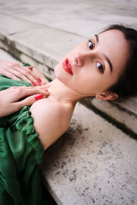 High angle portrait of woman lying down