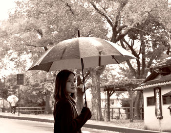 Woman holding umbrella