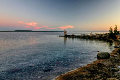 Scenic view of sea against sky during sunset