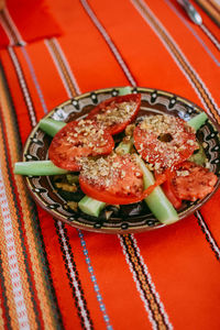 High angle view of fruit salad in plate on table