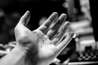 Close-up of man holding hands