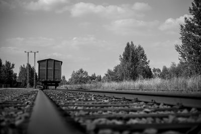 Surface level of railroad track against sky