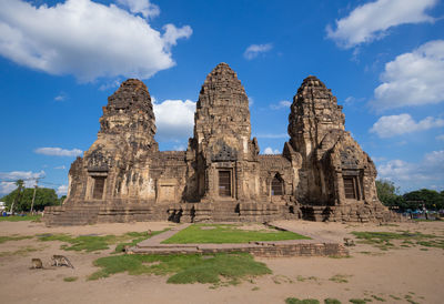 Old temple against cloudy sky