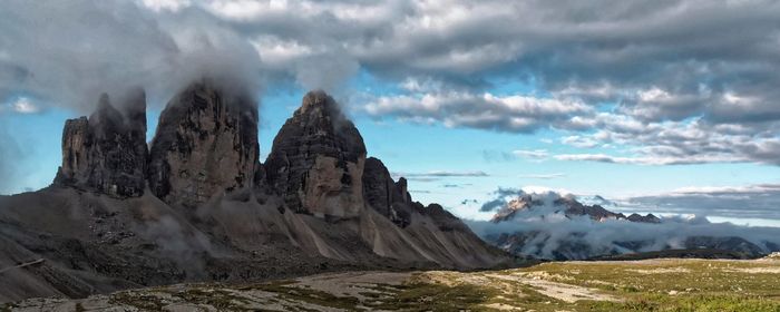 Panoramic view of snowcapped mountains against sky