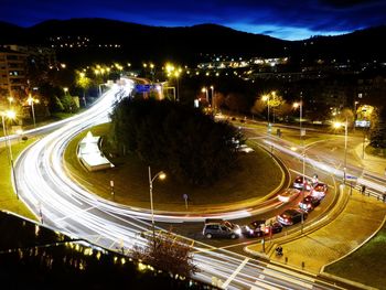 Cars moving on road at night