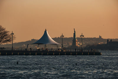 View of sea against clear sky during sunset