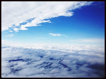 Scenic view of landscape against cloudy sky