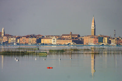 Reflection of buildings in lake