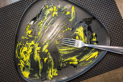 High angle view of vegetables in plate on table