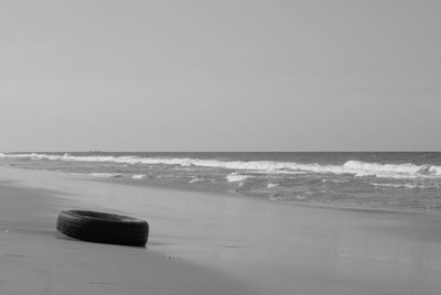 Scenic view of beach against clear sky