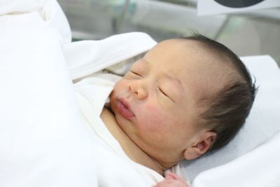 Close-up of baby girl sleeping