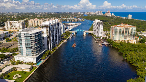 High angle view of buildings in city against sky