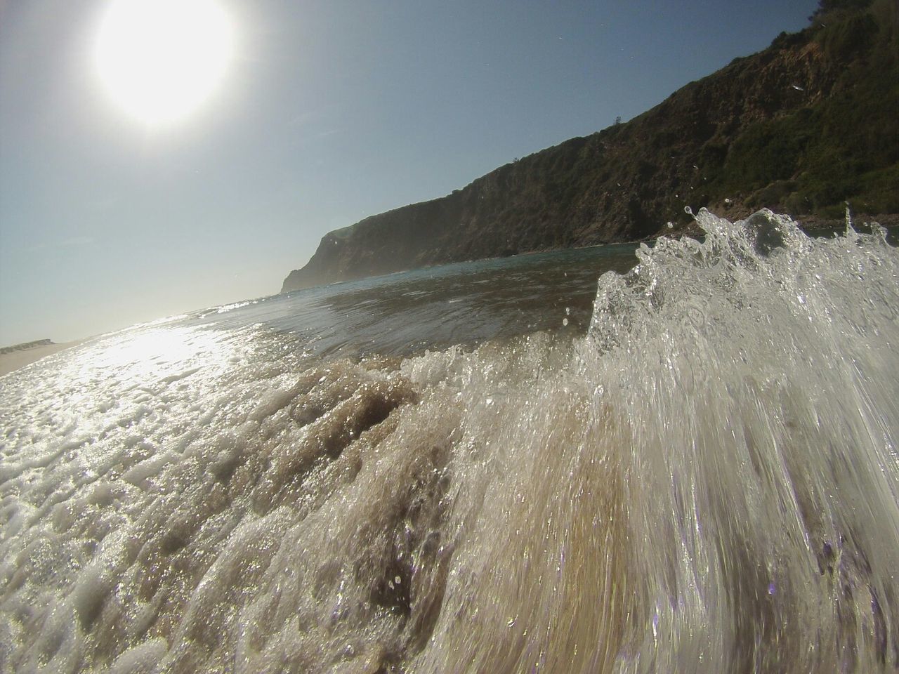 water, sea, sun, beauty in nature, scenics, sunlight, tranquil scene, tranquility, clear sky, beach, nature, sunbeam, wave, lens flare, sky, idyllic, horizon over water, sunny, shore, surf