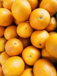 Full frame shot of oranges in market