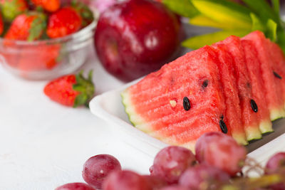 Close-up of strawberries in plate on table