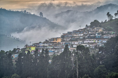 Buildings in city against sky