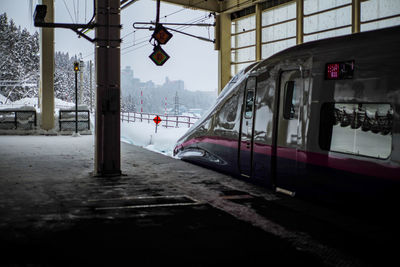 Train at railroad station during winter