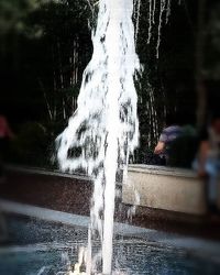 Blurred motion of water flowing through rocks