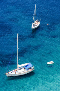 High angle view of sailboat sailing on sea