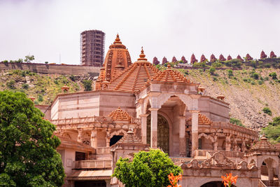 Artistic red stone jain temple at morning from unique angle