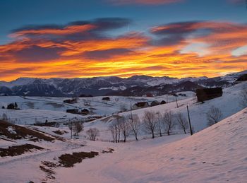 Scenic view of mountains against sky during sunset
