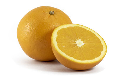 Close-up of lemon slice against white background