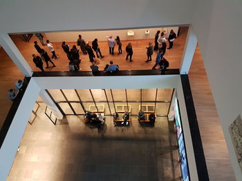 High angle view of men on escalator